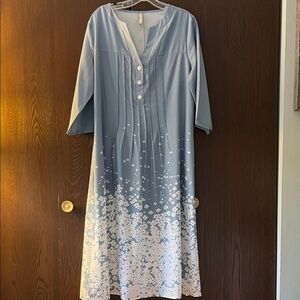 Noracora 3/4 sleeved blue maxi dress with white floral pattern. Size Large